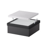 A black rectangular box with a mesh surface and two white pull tabs, topped with a removable high-efficiency filter panel, designed as the Replacement Filter for Falcon A1 Air Purifier by Creality Falcon. The background is plain white.