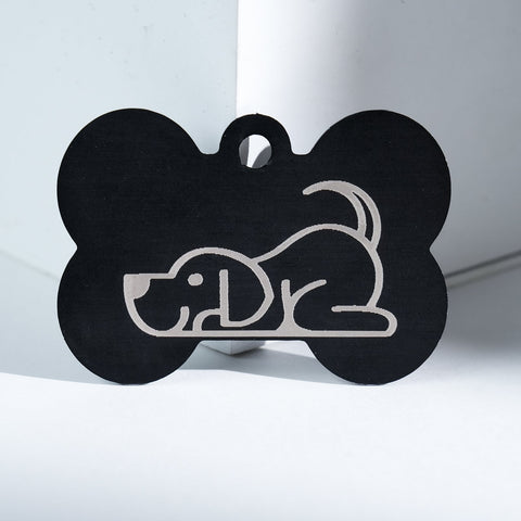 The Creality Falcon Large Multicolor Anodized Aluminum Dog Tag features a simple white line drawing of a playful dog standing upright, engraved on the tag's surface.